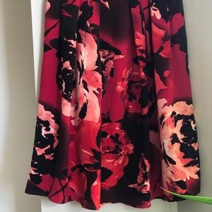 Eve Mendes red circle skirt